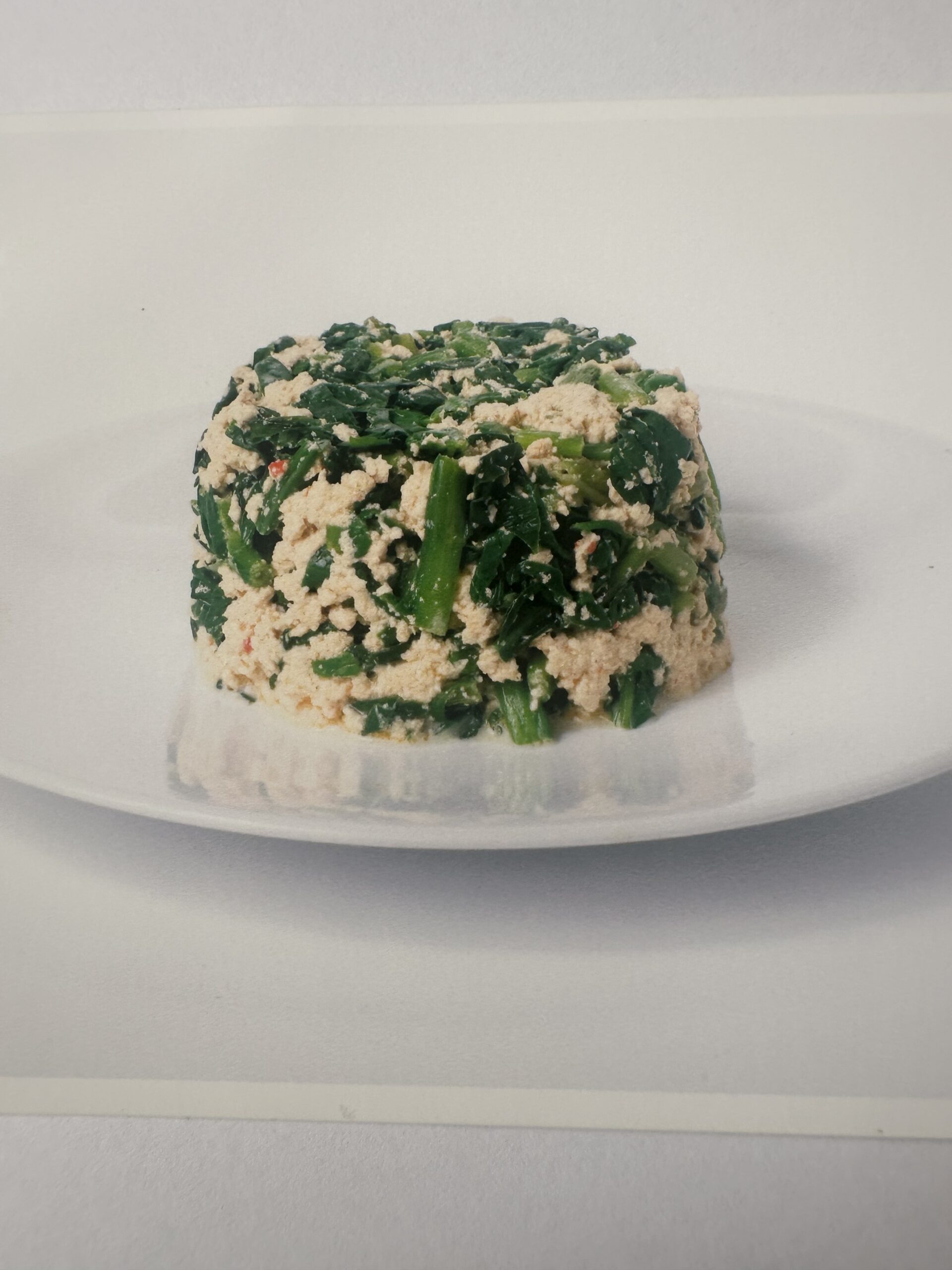 cooked leafy vegetaable with melon